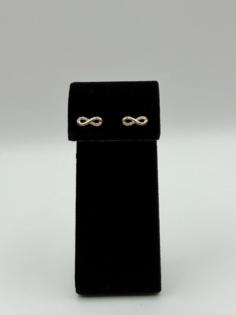ARETES SIMBOLO DE INFINITO CON ZIRCONIAS