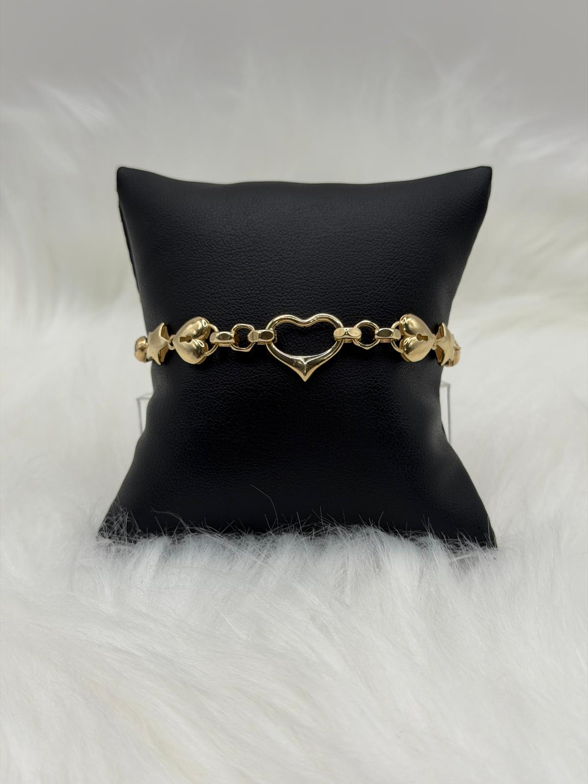 BRAZALETE EN ORO 10K CON CORAZON ESQUELETICO